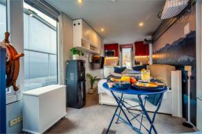 Houseboat Neptun with paddle boat - stay on the river